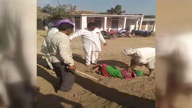 Villagers Beating Women